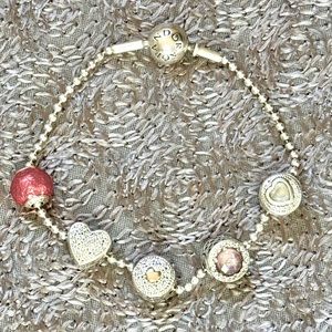 Pandora Sterling Silver ESSENCE bracelet with (5) Charms